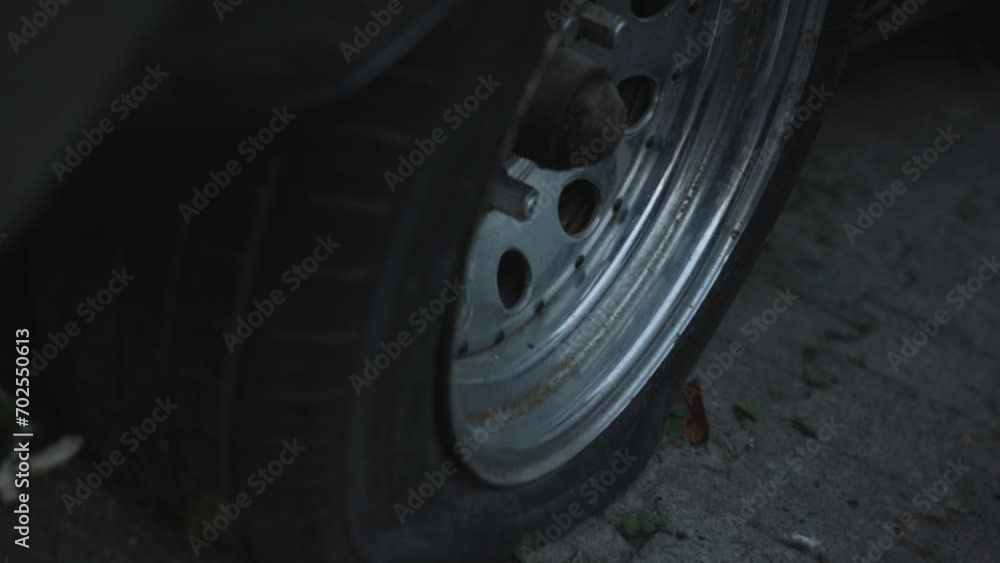Flat tire of a car Flat tire of a car