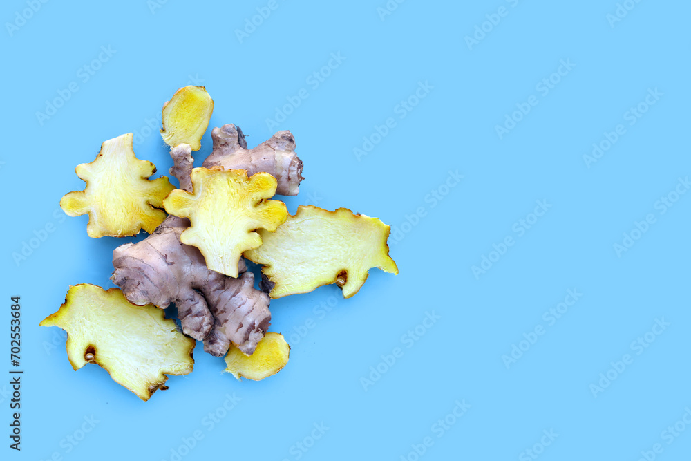 Fresh ginger on blue background. Fresh ginger on blue background.