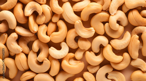 Curves of Nutrition: A Sea of Whole Cashew Nuts, creamy cashew nuts creating a textured, uniform backdrop