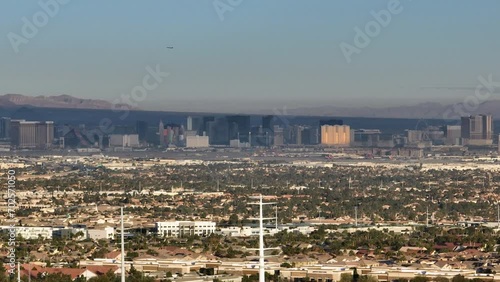 Aerial Reveal of Las Vegas Strip During the Day from Rocky Desert Landscape