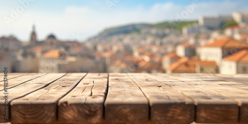The empty wooden table top with blur background of the old town Dubrovnik . Exuberant image. generative AI