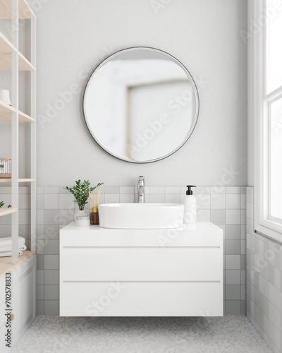 A modern white bathroom with a circle mirror on the white wall, a modern white bathroom sanity sink. photo