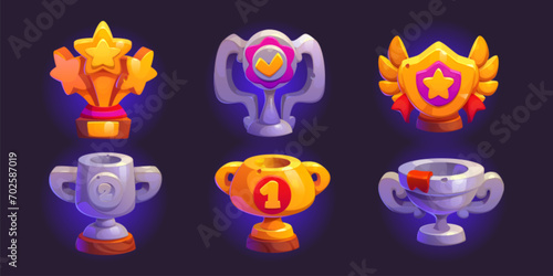 Game award goblet and trophy cup for gui design. Cartoon vector illustration set of silver and golden winner prize with ribbons, wings and star. Championship or competition achievement prize.