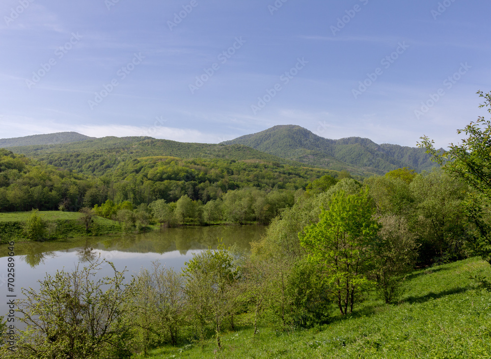 Mountain lakes - sources, springs of clean drinking water in nature, spring walks in the bosom of nature. Mountain lakes - sources, springs of clean drinking water in nature, spring walks in the bosom of nature.