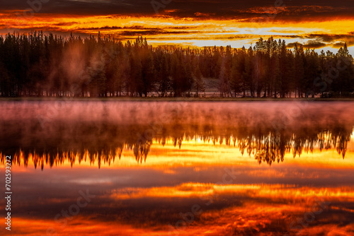 Gorgeous sunrise behinde Lake Yellowstone in the Yellowstone National Park