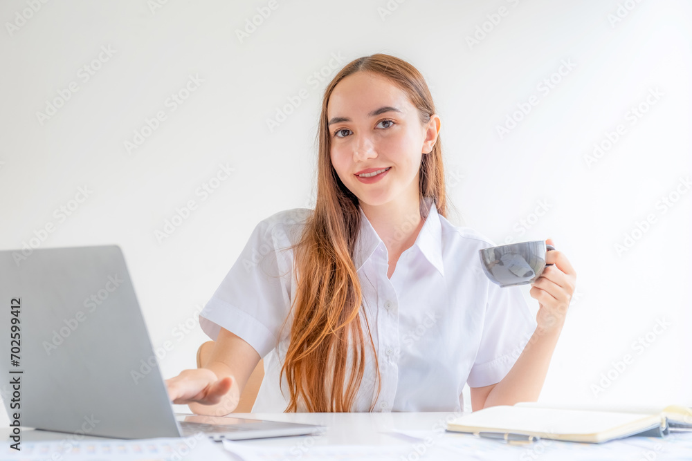 Businesswomen management drinks coffee and plans strategies to increase business income with typing laptops. Have a working finance graph analysis and discuss the new target success Businesswomen management drinks coffee and plans strategies to increase business income with typing laptops. Have a working finance graph analysis and discuss the new target success