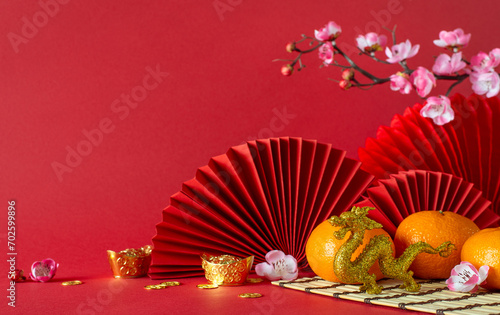 фотографія Traditional New Year tableau: side view feng shui elements, gold coins, dragon o