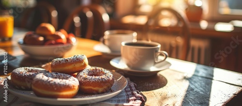 Home-cooked breakfast: doughnuts and coffee on the table.
