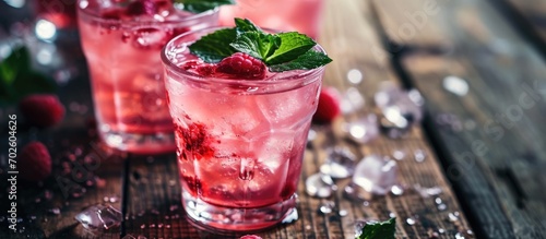 A detailed image of pink drink in glasses.