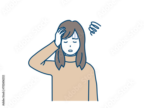 頭痛や貧血の症状　頭をおさえる若い女性のイラスト