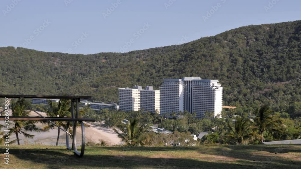 Nice view overlooking catseye beach on Hamilton island, queensland australia - with large white building in background on stunning sunny summer day. Nice view overlooking catseye beach on Hamilton island, queensland australia - with large white building in background on stunning sunny summer day.