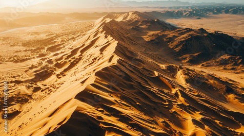 Aerial Photography, overhead perspective of the Gobi Desert, midday sun, rugged terrain, contrasting shadows, beige and light brown hues photo