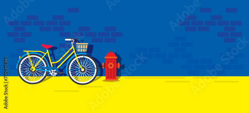 Bicycles parked against the roadside blue wall. kids art. cartoon banner template, poster, books photo