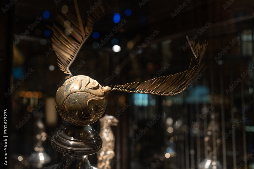 Fototapeta premium JAPAN - NOV 13, 2023: Quidditch or golden snitch equipment for sport play game with flying broomstick at Warner Bros. Studio Tour Tokyo, The Making of Harry Potter, Wizarding World