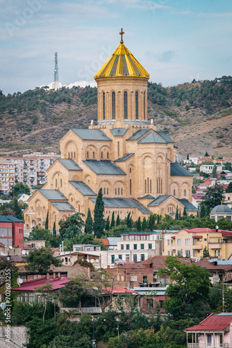 View on the Sameba cathedral and its golden dome from the Narikala fortress in old Tbilisi (Georgia)