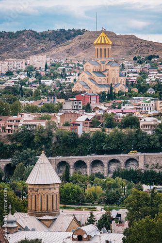 View on the Sameba cathedral with the Sioni cathedral in the foreground in Tbilisi Old Town, Georgia © Pernelle Voyage