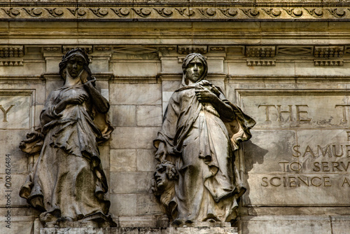 Monuments and statues of Manhattan, which adorn the facade of the New York Public Library in the Big Apple. It is an icon in the world. photo