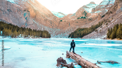 Glacial Reflection: A Moment of Serenity amid the Winter Landscape of Ibon de Plan (Basa de la Mora) in the Pyrenean Heights
 photo