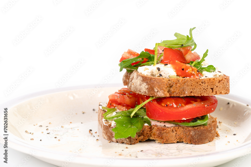 Sandwiches with soft cheese and herbs and tomatoes Sandwiches with soft cheese and herbs and tomatoes