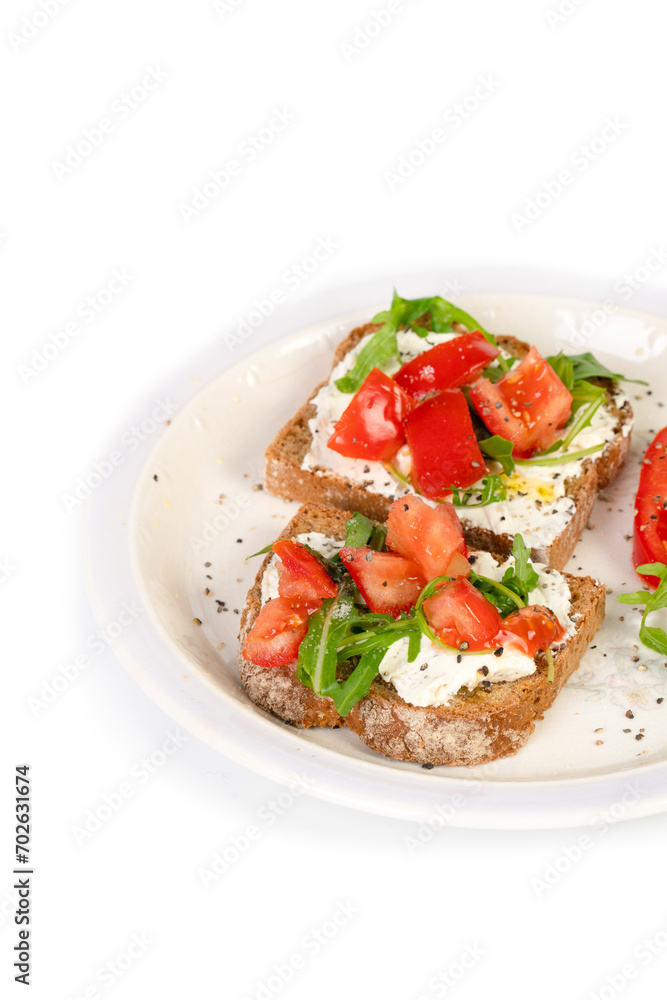 Sandwiches with soft cheese and herbs and tomatoes