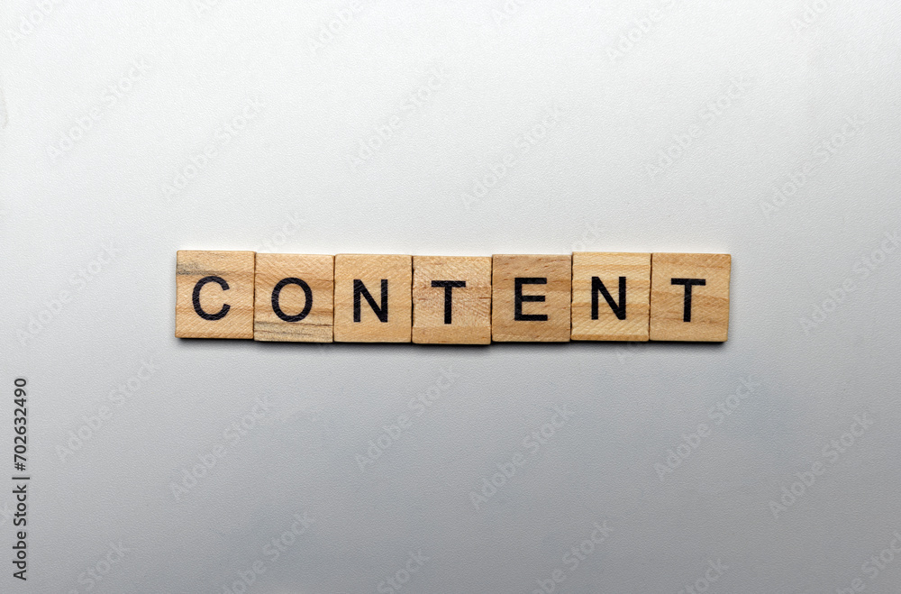 A row of wooden cubes with content letters