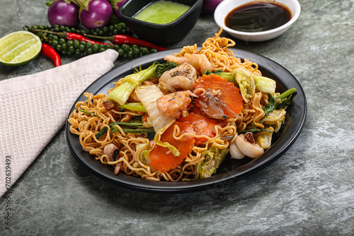 Asian cuisine - Fried noodles with seafood