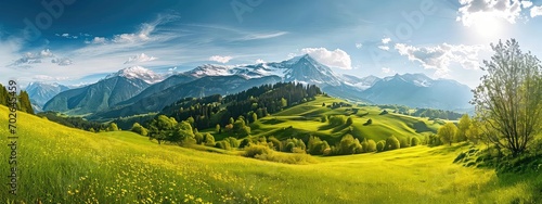 Idyllic mountain landscape in the Alps with blooming meadows in summer springtime © Ainur