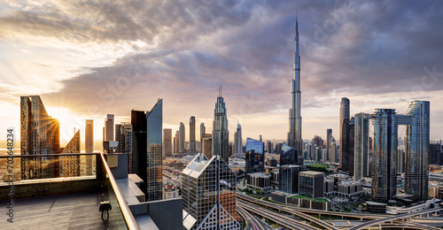Dubai, UAE, January 11 2023: Dramatic sunrise over Dubai skyline panorama with Burj Khalifa and luxury skyscrapers, United Arab Emirates