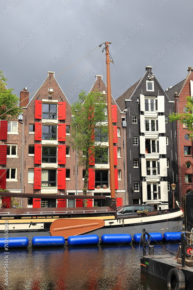 Amsterdam Brouwersgracht Canal House Facades with Wooden Shutters and Houseboat, Netherlands