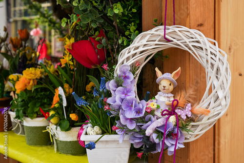 Easter wreath with bunny in the flower shop photo