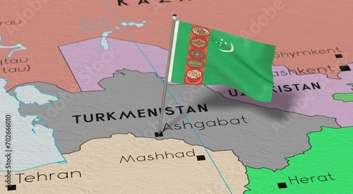 Turkmenistan, Ashgabat - national flag pinned on political map - 3D illustration photo