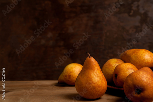 Pears on wooden background as background image..