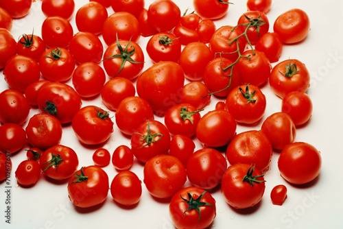 cherry tomatoes on white background © Karen