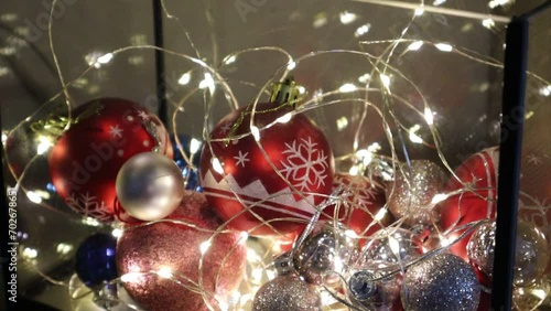 A lot of New Year's balls close-up. Decorating the house for New Year and Christmas. Beautiful New Year decorations
