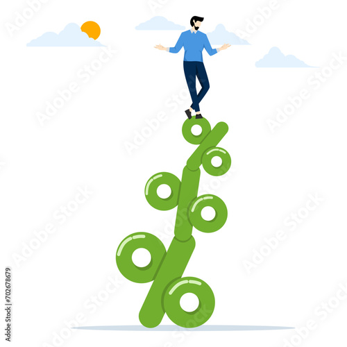 businessman balance on percentage stack. Rising interest rates risk causing business slowdowns, banking problems or unstable financial debt, and there is a risk of economic recession.