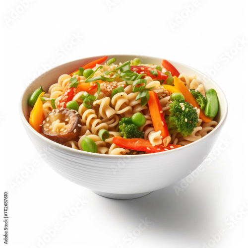 A bowl of freshly cooked noodles with a variety of vegetables isolated on white background