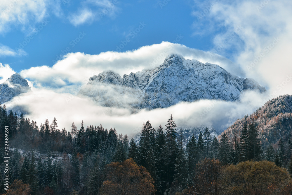 Amazing landscape with snowy mountain peaks in Julian alps near Kranjska gora in Slovenia