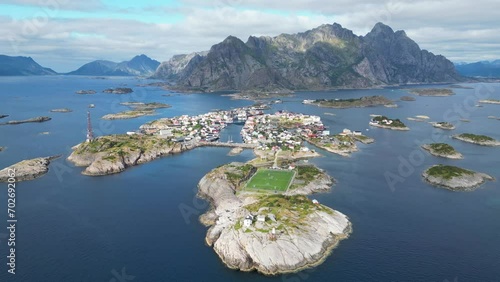 Henningsvaer Village and Soccer Field in Lofoten Island Archipelago, Norway - 4k Aerial photo