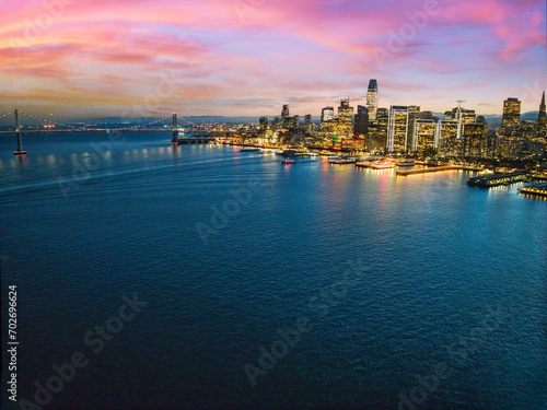 Aerial view of San Francisco city skyline at sunset  illuminated by the city lights