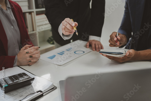 Financial accountant planner meeting business consultation introduction  Group of accountant persons talking in the office  businessperson s hand calculating invoice at workplace.