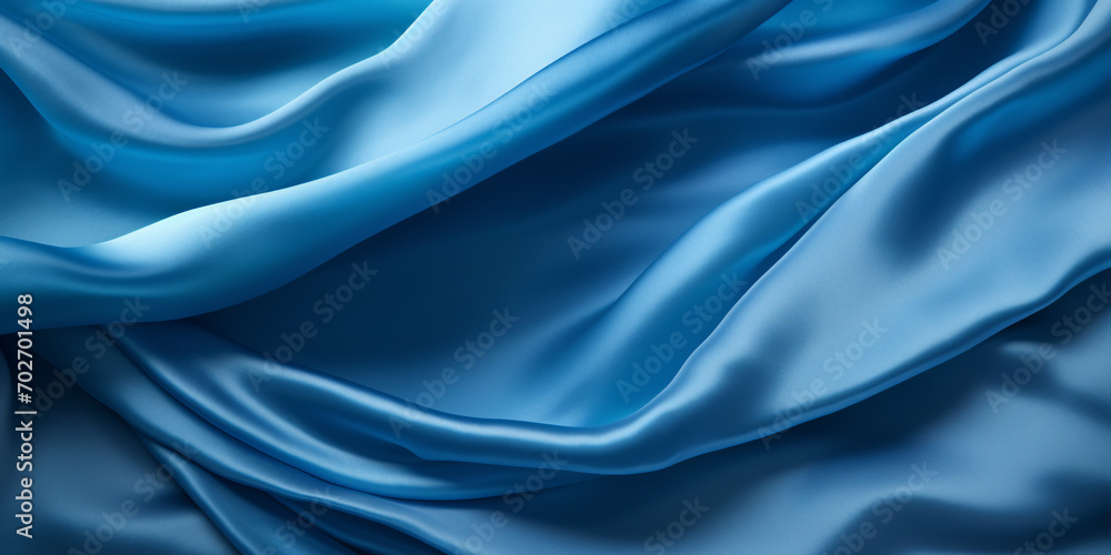 Fototapeta premium Blue silk textile texture with folds