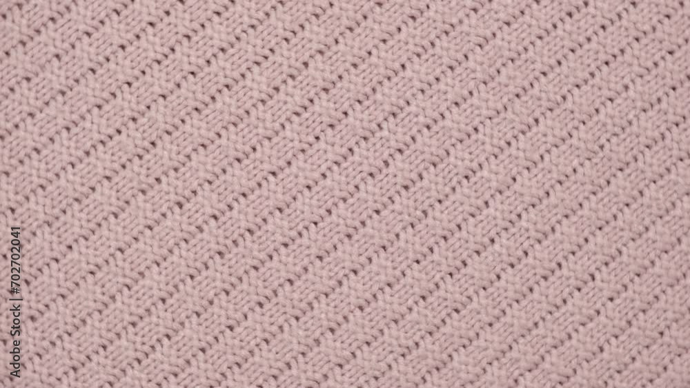 Soft Knitted Woolen Detailed Texture. Natural Fabric Closeup Knit Pattern. Pink Knitwear, Warm Cashmere Surface. Rotation, Macro. Cozy Textile Background. Clothes Production. Melange Yarn. 4K Shot Soft Knitted Woolen Detailed Texture. Natural Fabric Closeup Knit Pattern. Pink Knitwear, Warm Cashmere Surface. Rotation, Macro. Cozy Textile Background. Clothes Production. Melange Yarn. 4K Shot