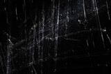 Abstract background. The shine of polyethylene. Synthetic glitter on black