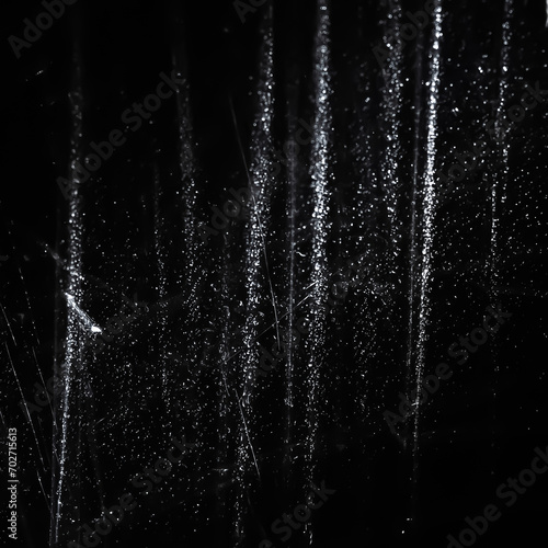 Abstract background. Polyethylene shine. Synthetic glitter on black