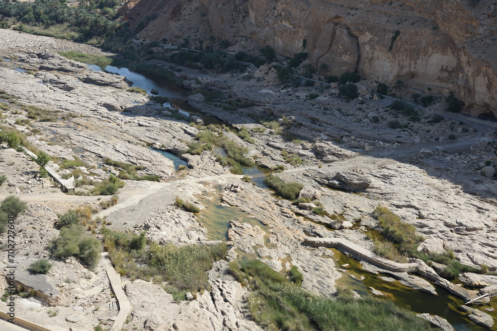 Wadi Dhaiqah almost dry river bed nearby Dayqah Dam, Muscat, Oman visitor center on a hot sunny day Wadi Dhaiqah almost dry river bed nearby Dayqah Dam, Muscat, Oman visitor center on a hot sunny day