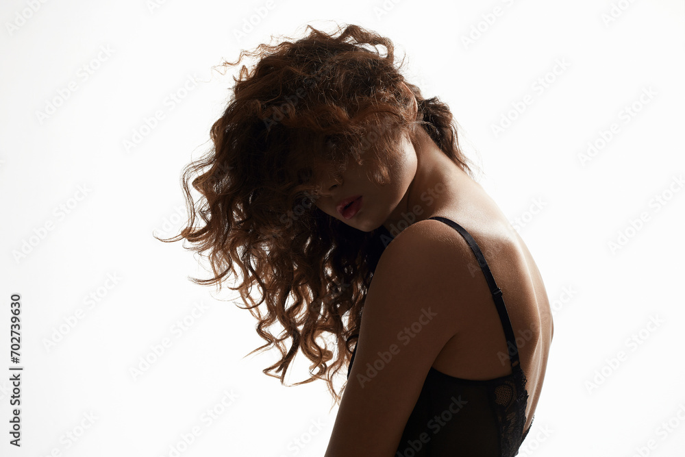 Obraz premium Sexy Back of Woman with curly Hair. Hairy Girl in Sexual lingerie