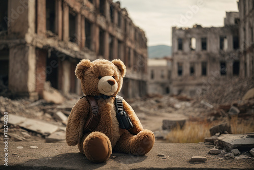 toy bear on the background of a ruined city