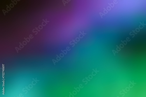 Abstract blurred background image of blue, green, purple colors gradient used as an illustration. Designing posters or advertisements.