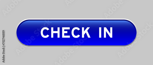 Blue color capsule shape button with word check in on gray background