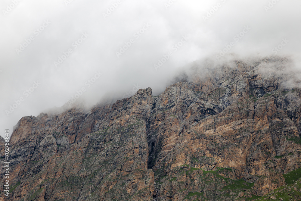 majestic Caucasus mountains drowning in clouds